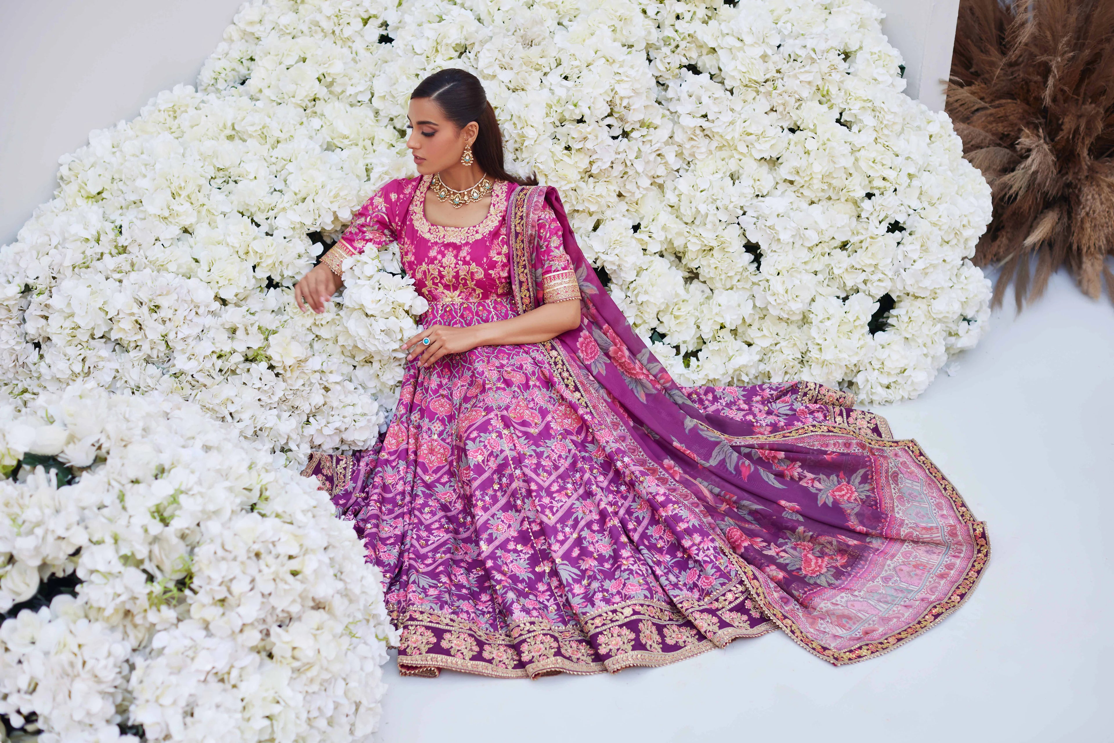NISHA MINA HASAN
