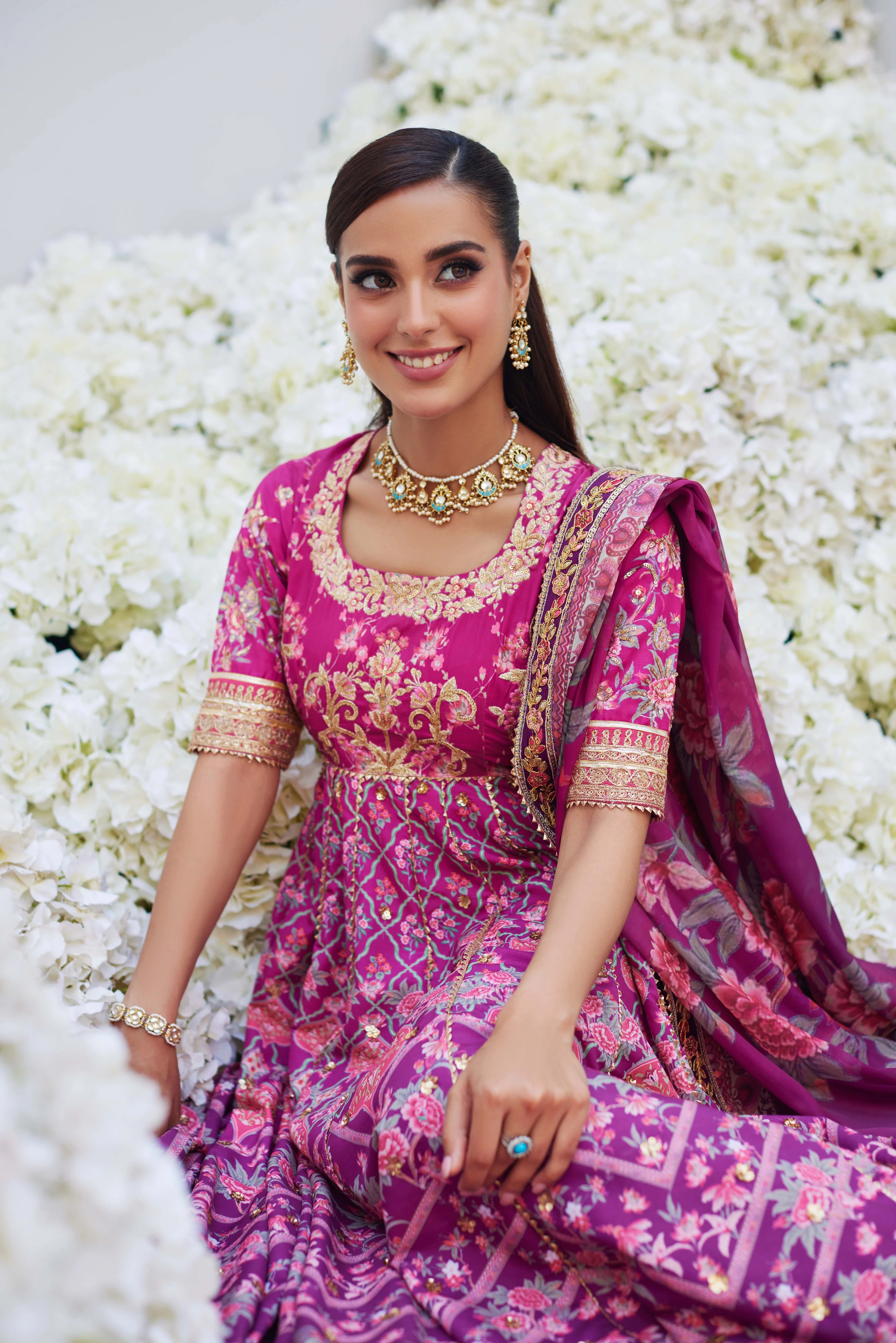 NISHA MINA HASAN